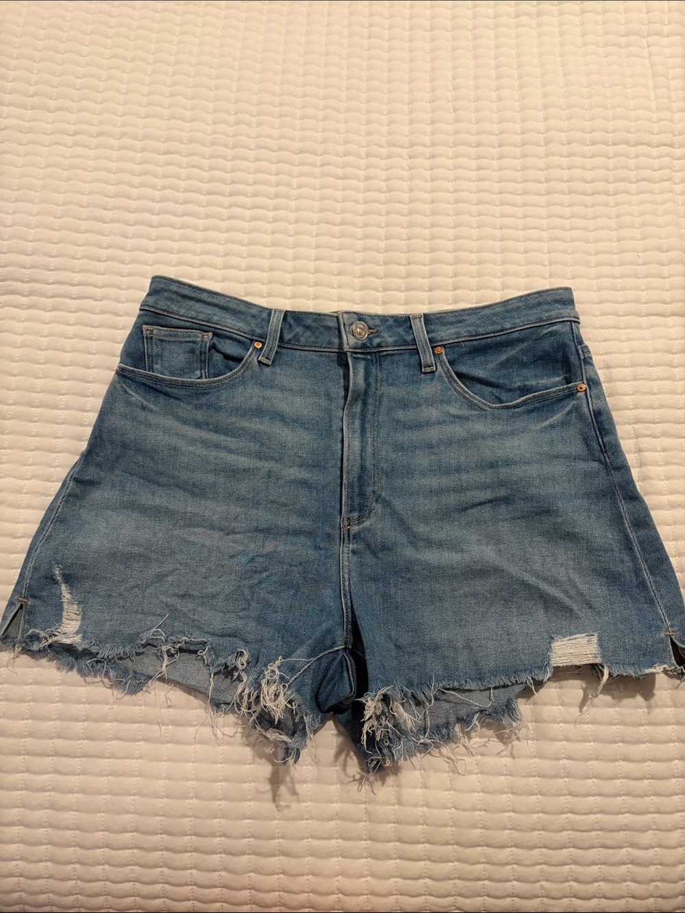 PAIGE Distressed Blue Denim Cutoff Shorts